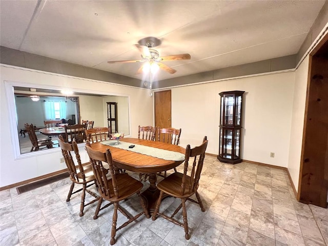 416 E Quail Rd, Chickasha, OK 73018 - dining space featuring ceiling fan and baseboards