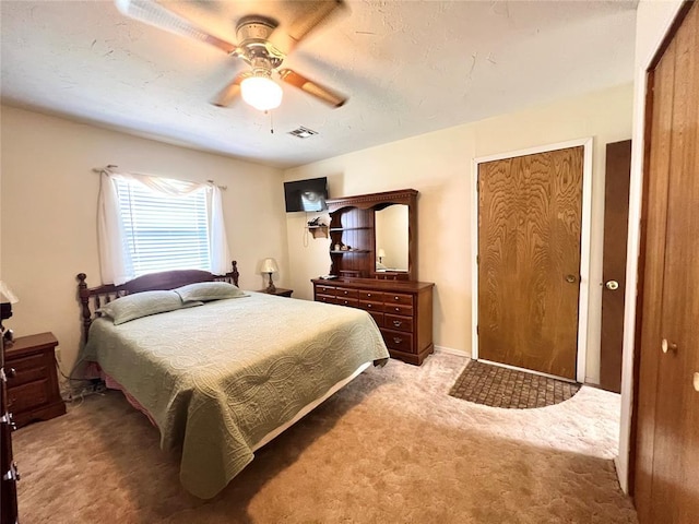 416 E Quail Rd, Chickasha, OK 73018 - carpeted bedroom featuring a ceiling fan