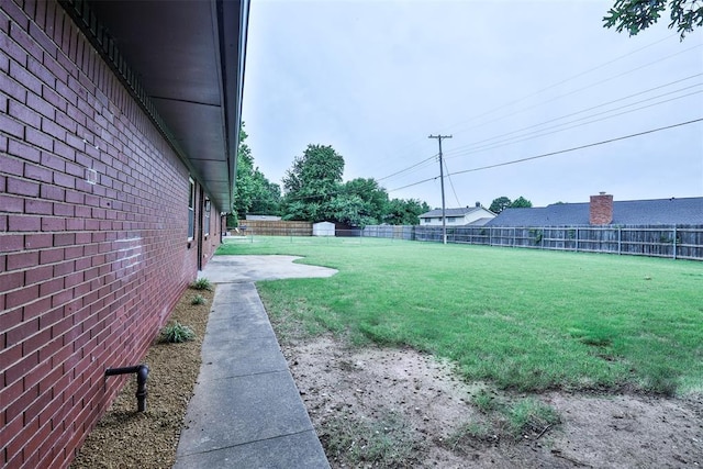 336 N Sherry Ave, Norman, OK 73069 - fenced backyard with a patio area