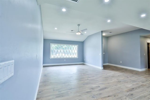 336 N Sherry Ave, Norman, OK 73069 - spare room featuring a ceiling fan, vaulted ceiling, recessed lighting, and wood finished floors