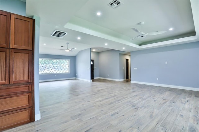 336 N Sherry Ave, Norman, OK 73069 - empty room featuring ceiling fan, a raised ceiling, light wood-style floors, and recessed lighting
