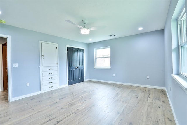 336 N Sherry Ave, Norman, OK 73069 - unfurnished bedroom featuring light wood-style floors, a closet, a ceiling fan, and recessed lighting