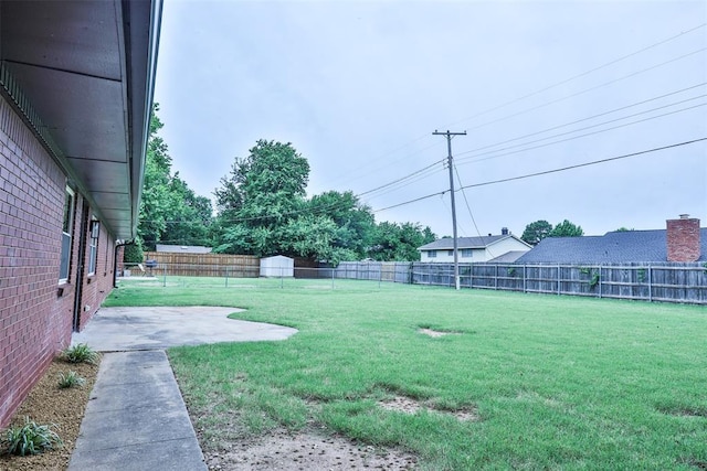 336 N Sherry Ave, Norman, OK 73069 - fenced backyard featuring a patio