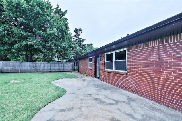 336 N Sherry Ave, Norman, OK 73069 - fenced backyard featuring a patio area
