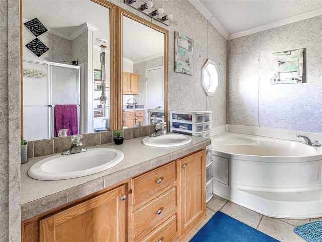 19108 Finn Ridge Rd, Purcell, OK 73080 - bathroom featuring ornamental molding, a garden tub, a stall shower, double vanity, and tile patterned flooring