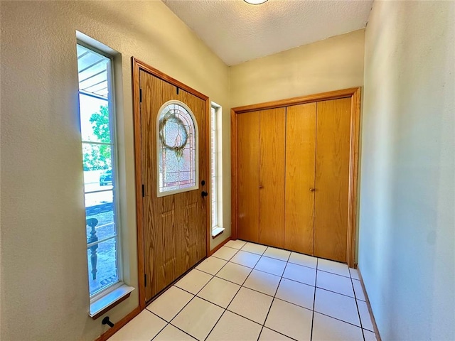12 Northwood Dr, Shawnee, OK 74804 - foyer entrance with healthy amount of natural light and light tile patterned floors