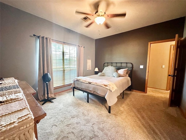 12 Northwood Dr, Shawnee, OK 74804 - carpeted bedroom featuring ceiling fan and baseboards