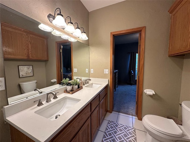12 Northwood Dr, Shawnee, OK 74804 - ensuite bathroom with double vanity and tile patterned floors