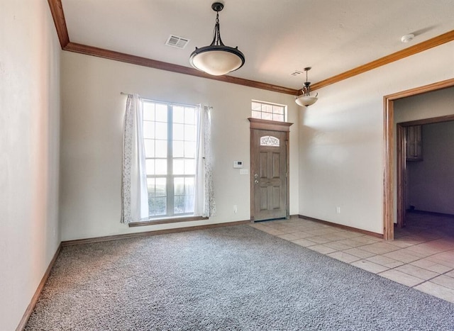 5704 Bent Creek Dr, Oklahoma City, OK 73135 - foyer entrance featuring crown molding, healthy amount of natural light, light colored carpet, baseboards, and light tile patterned floors
