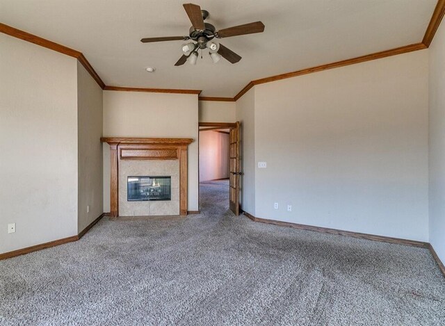 5704 Bent Creek Dr, Oklahoma City, OK 73135 - unfurnished living room featuring carpet, a ceiling fan, ornamental molding, a fireplace, and baseboards