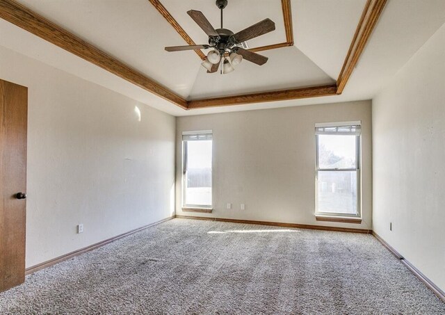 5704 Bent Creek Dr, Oklahoma City, OK 73135 - carpeted empty room featuring a raised ceiling, a ceiling fan, and baseboards