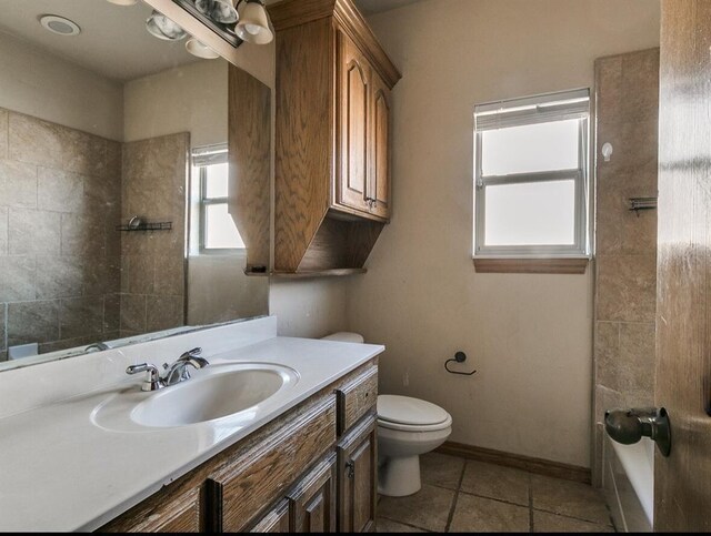 5704 Bent Creek Dr, Oklahoma City, OK 73135 - full bathroom with vanity, toilet, baseboards, tile patterned floors, and shower / bathtub combination