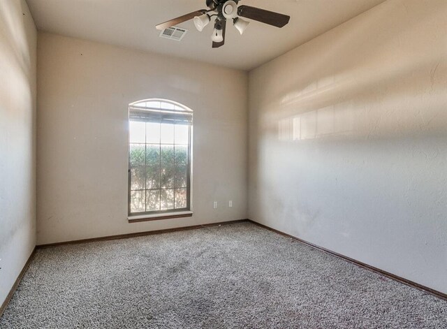 5704 Bent Creek Dr, Oklahoma City, OK 73135 - carpeted empty room with a ceiling fan and baseboards