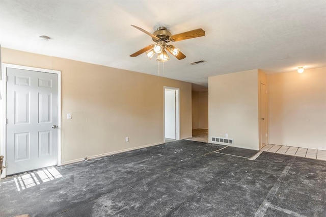 2604 N Ann Arbor Ave Unit 224, Oklahoma City, OK 73127 - unfurnished living room with ceiling fan and baseboards