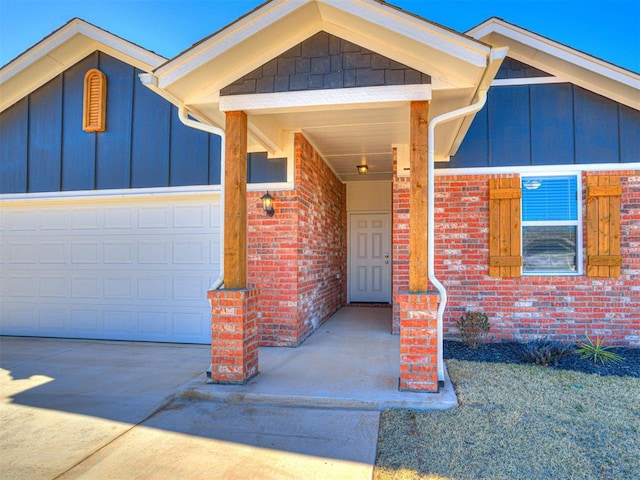 813 Stella Trl, Guthrie, OK 73044 - view of front of home featuring board and batten siding, driveway, brick siding, and an attached garage