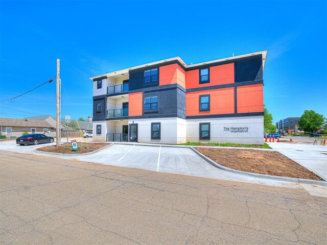 103 E Edwards St, Edmond, OK 73034 - view of building exterior featuring uncovered parking