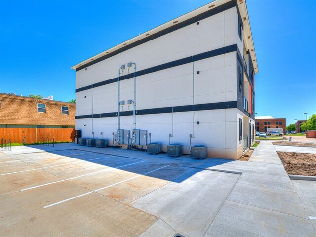 103 E Edwards St, Edmond, OK 73034 - view of property featuring central AC unit