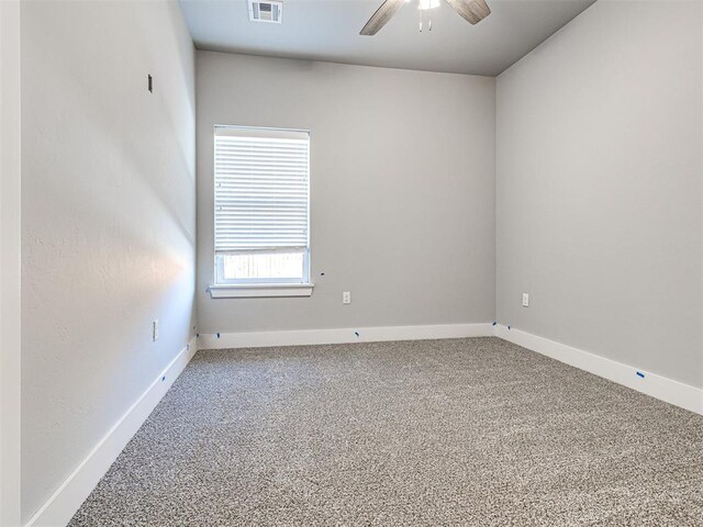 103 E Edwards St, Edmond, OK 73034 - carpeted spare room with a ceiling fan and baseboards