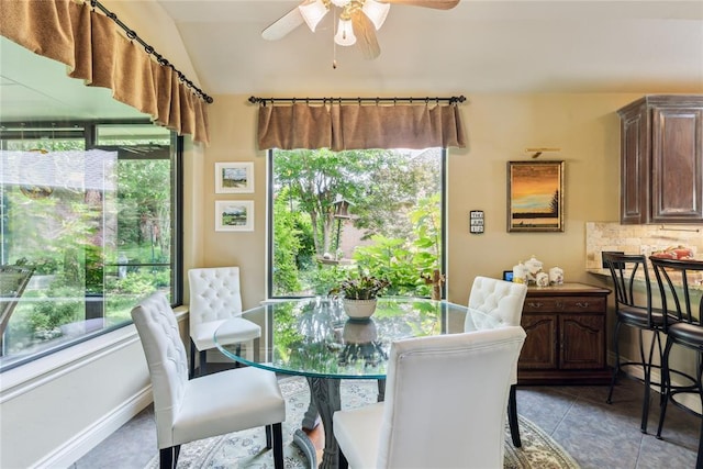3201 Pinehurst Dr, Norman, OK 73072 - dining area featuring plenty of natural light, ceiling fan, tile patterned flooring, and lofted ceiling
