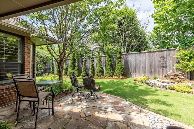 3201 Pinehurst Dr, Norman, OK 73072 - fenced backyard featuring a patio area and outdoor dining area