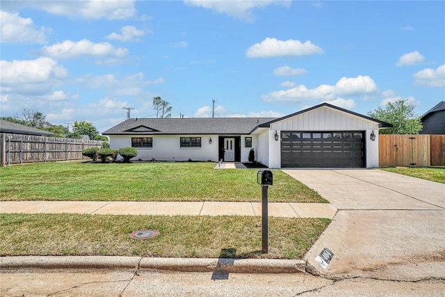 404 Comanche Trl, Altus, OK 73521 - view of front of house featuring a garage and concrete driveway