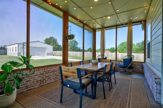 612 E Coffee Creek Rd, Edmond, OK 73034 - sunroom / solarium with outdoor dining area and brick wall