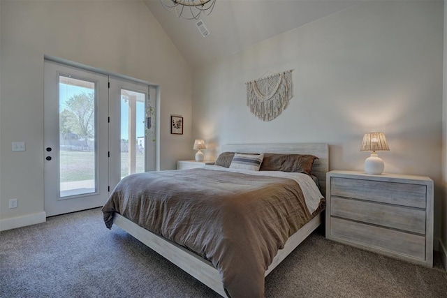 612 E Coffee Creek Rd, Edmond, OK 73034 - bedroom featuring access to exterior, carpet floors, high vaulted ceiling, and baseboards