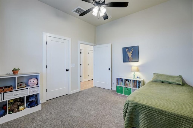 612 E Coffee Creek Rd, Edmond, OK 73034 - bedroom with carpet floors, baseboards, and ceiling fan