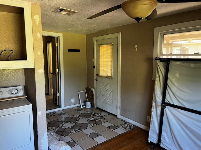 305 N Reimer St, Corn, OK 73024 - laundry area with washer / dryer, a textured ceiling, ceiling fan, and baseboards