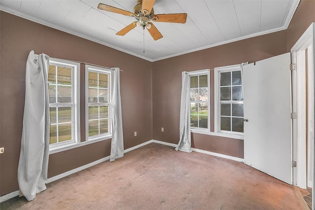 209 E 3rd St, Erick, OK 73645 - spare room featuring ornamental molding, carpet, baseboards, and ceiling fan