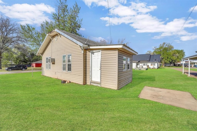 209 E 3rd St, Erick, OK 73645 - view of property exterior featuring a yard