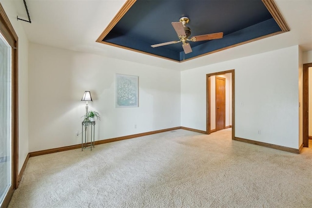 4113 Old Farm Rd, Oklahoma City, OK 73120 - carpeted empty room featuring a tray ceiling and a ceiling fan