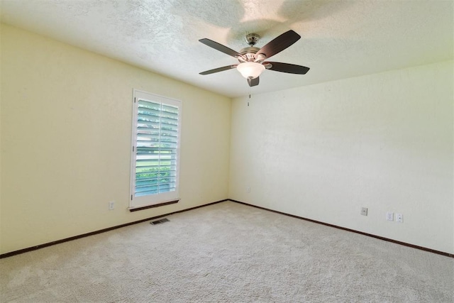 4113 Old Farm Rd, Oklahoma City, OK 73120 - unfurnished room with ceiling fan, carpet, and a textured ceiling