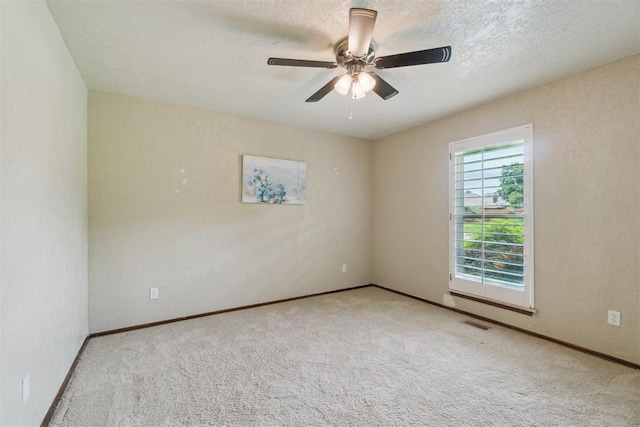 4113 Old Farm Rd, Oklahoma City, OK 73120 - empty room featuring a ceiling fan, carpet flooring, and a textured ceiling