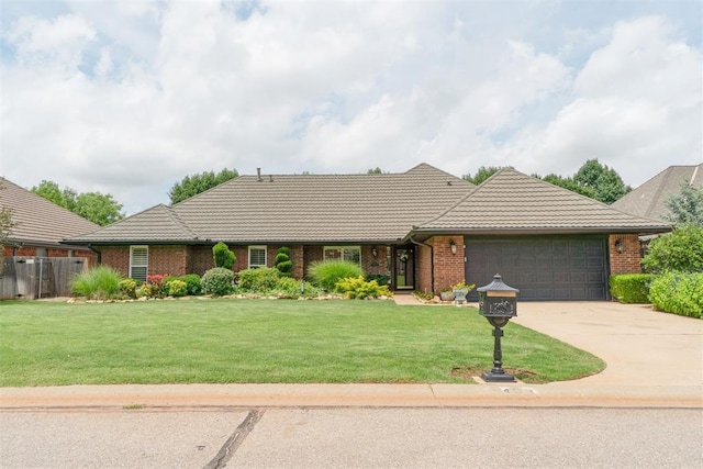 4113 Old Farm Rd, Oklahoma City, OK 73120 - single story home featuring an attached garage, driveway, a tiled roof, and brick siding
