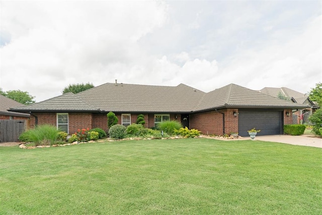 4113 Old Farm Rd, Oklahoma City, OK 73120 - single story home featuring a tile roof, brick siding, an attached garage, and driveway