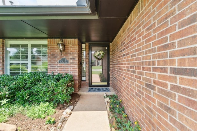 4113 Old Farm Rd, Oklahoma City, OK 73120 - view of exterior entry featuring brick siding and covered porch