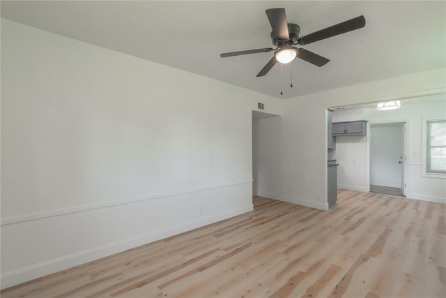 508 S Morrison Ave, El Reno, OK 73036 - unfurnished bedroom with light wood-type flooring, baseboards, a closet, and ceiling fan