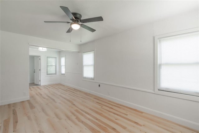 508 S Morrison Ave, El Reno, OK 73036 - unfurnished room with a ceiling fan, wood finished floors, and baseboards