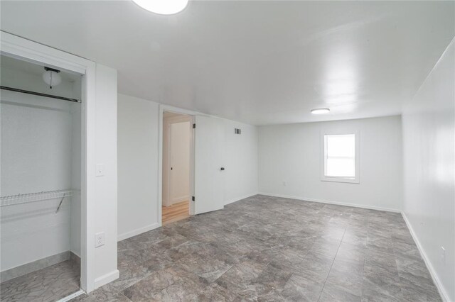 508 S Morrison Ave, El Reno, OK 73036 - unfurnished bedroom with baseboards and a closet