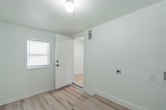 508 S Morrison Ave, El Reno, OK 73036 - spare room with light wood-style flooring and baseboards