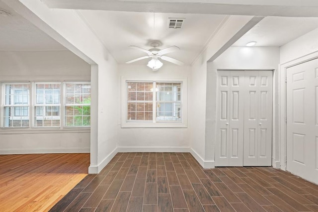 905 NE 21st St, Oklahoma City, OK 73105 - entryway featuring ceiling fan, baseboards, dark wood-type flooring, and ornamental molding