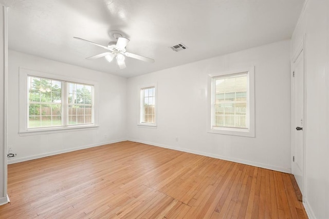 905 NE 21st St, Oklahoma City, OK 73105 - unfurnished room with light wood finished floors, a ceiling fan, and baseboards