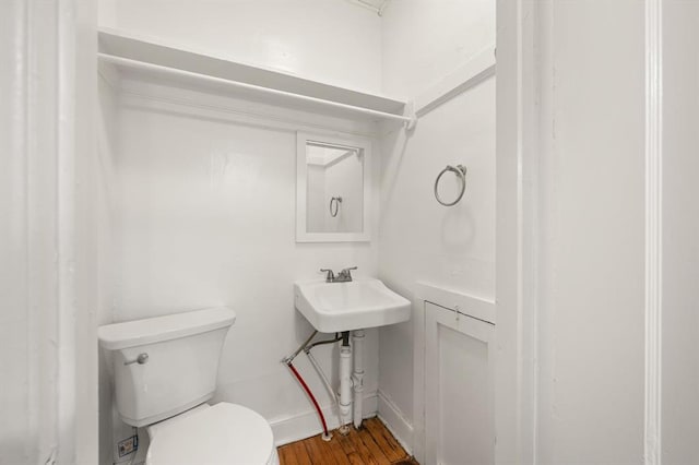 905 NE 21st St, Oklahoma City, OK 73105 - half bath with toilet and wood finished floors