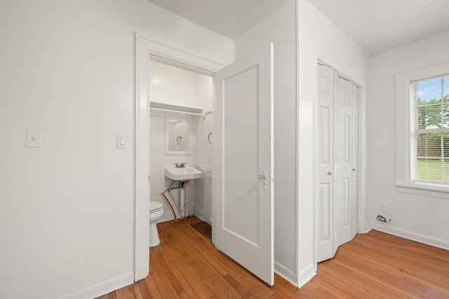 905 NE 21st St, Oklahoma City, OK 73105 - hall with light wood finished floors and baseboards