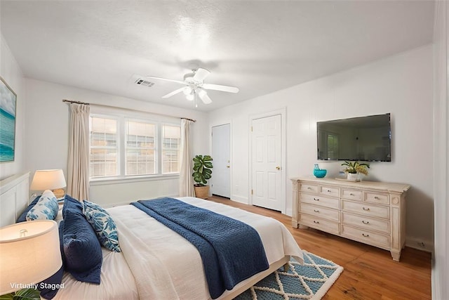 905 NE 21st St, Oklahoma City, OK 73105 - bedroom with wood finished floors, ceiling fan, and baseboards