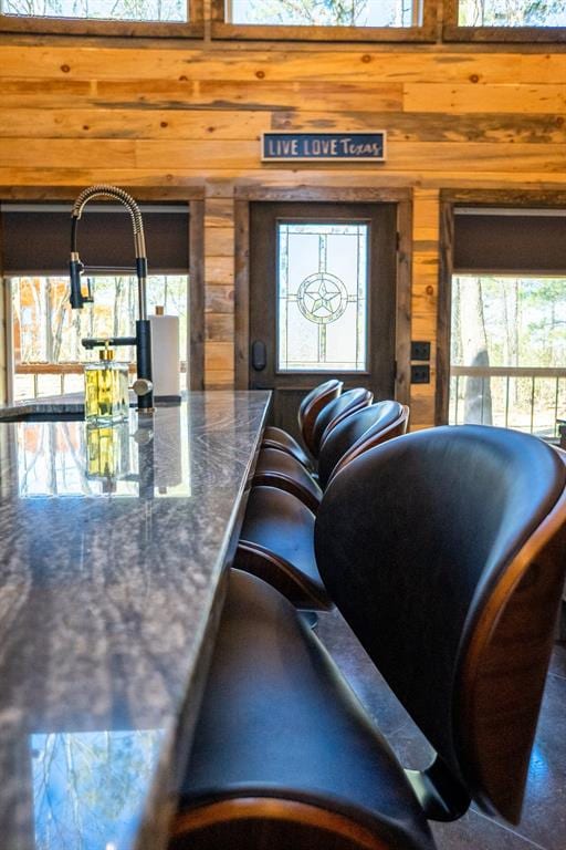 161 Champion Way, Broken Bow, OK 74728 - living room featuring wood walls