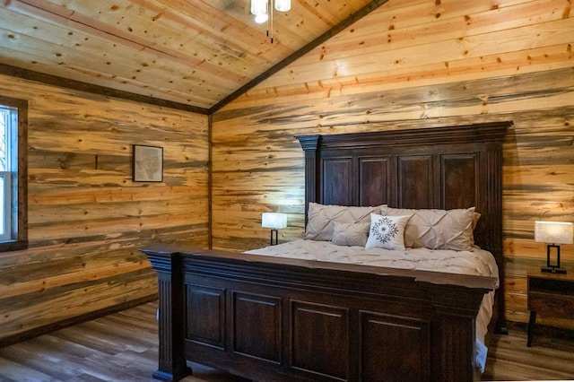 161 Champion Way, Broken Bow, OK 74728 - bedroom with vaulted ceiling, wooden walls, wooden ceiling, and dark wood finished floors