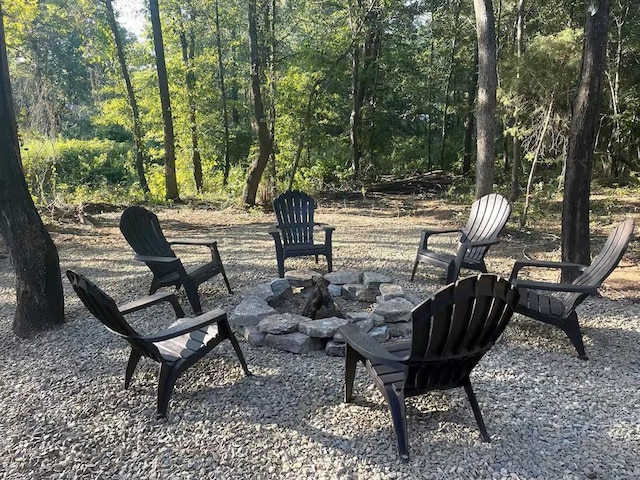 161 Champion Way, Broken Bow, OK 74728 - view of patio / terrace with an outdoor fire pit