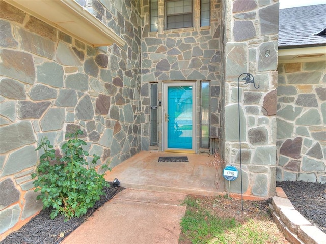 17612 Durbin Park Rd, Edmond, OK 73012 - view of exterior entry featuring stone siding